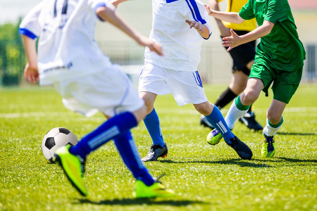 Football soccer tournament for youth teams. Soccer football training camp for kids, children.の写真素材
