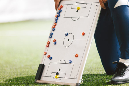 Soccer Coaching Tactics Board on Field; Football Strategy Planning for Youth Training and Match...