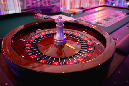 Roulette wheel in casino. Roulette wheel in casino.