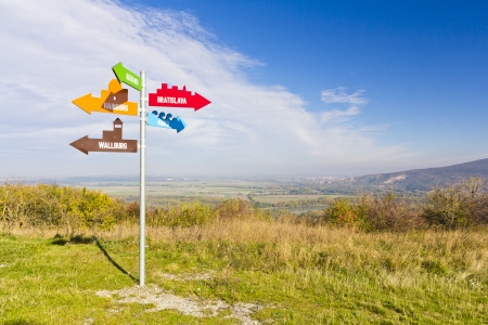 crossroad signs on hill near Brausberg, Hainburg city, Austriaの写真素材