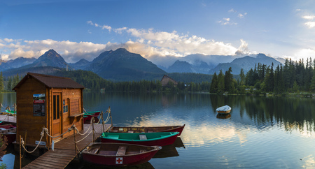Boat on the dock surrounded mountains. Strbske Pleso High Tatras. Slovakia, Europe.のeditorial素材
