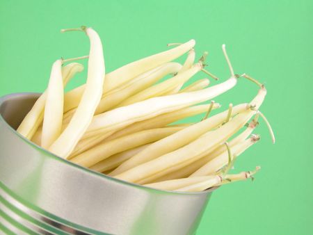 can full of fresh yellow string beans close-upsの写真素材