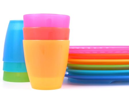 stack of plastic cups and plates - perfect for picnicの写真素材