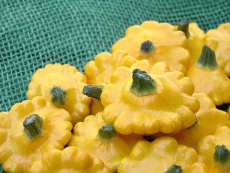 close-ups of yellow pumpkins on green backgroundの写真素材