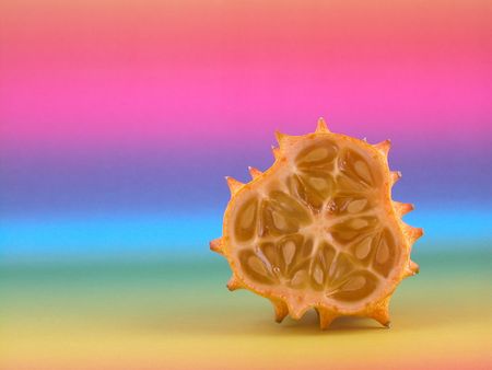 half of kiwano - close-ups on colorful backgroundの写真素材