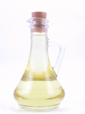 bottle of olive oil isolated on whiteの写真素材