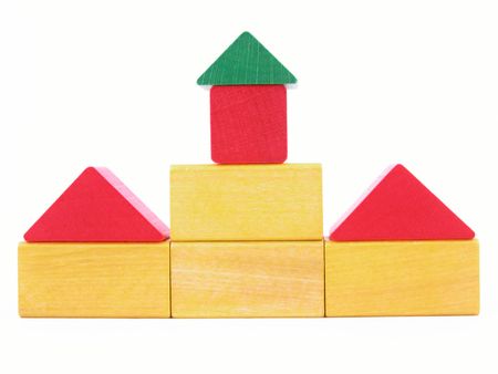 wooden blocks - yellow and red isolated on whiteの写真素材