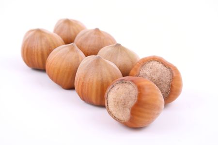 pile of hazelnuts isolated on white