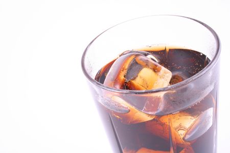 glass of cola isolated on white close-upsの写真素材