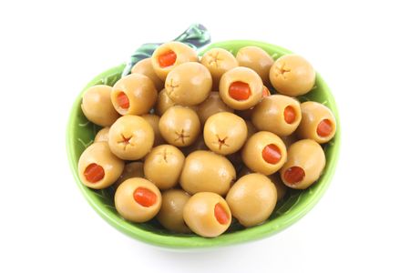 bowl of green olives isolated on white