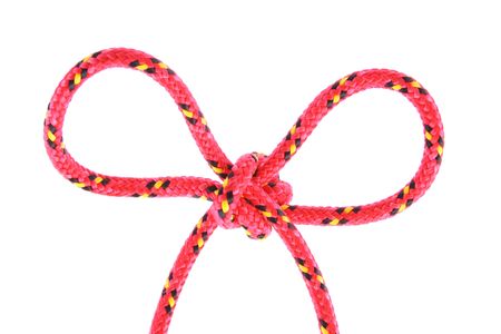 cockade made from red rope isolated on whiteの写真素材