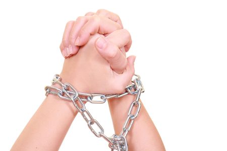 two hands with chain isolated on whiteの写真素材