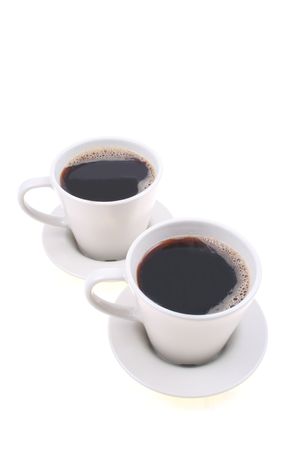 two cups of coffee isolated on whiteの写真素材