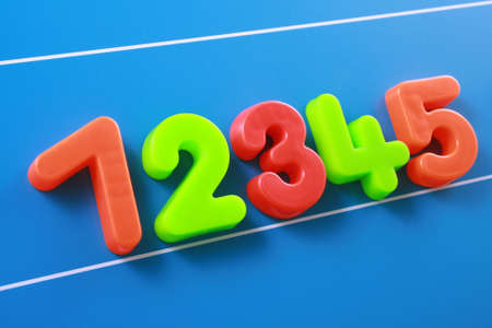 close-ups of colorful number on blue board - educationの写真素材