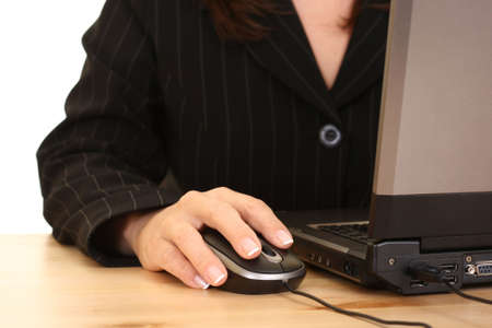 close-ups of mouse and woman hand - computer workの写真素材