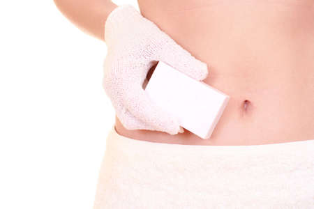 woman in towel with bath glove and soap isolated on white - body careの写真素材