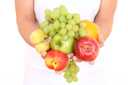 fresh fruits in hands on whiteの写真素材