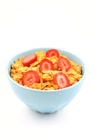 bowl of corn flakes with strawberry isolated on white