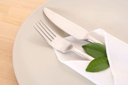 set of knife fork and plate on the table