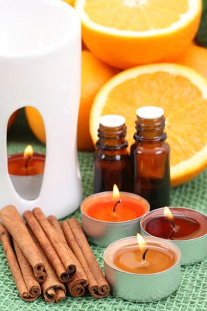aromatherapy - perfect for winter time - candles and orangesの写真素材
