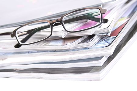 stack of magazines isolated on white