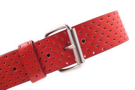 red leather belt isolated on white backgroundの写真素材