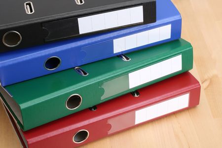four colors files on table - office work