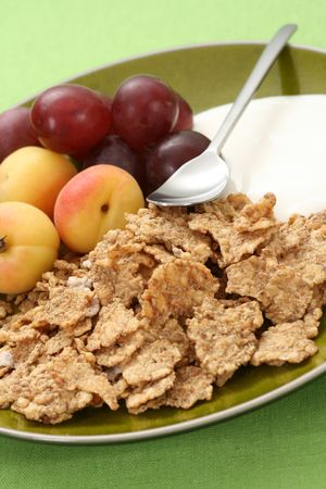 bowl full of musli and fresh fruits - healthy breakfast