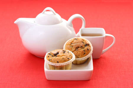 cup of tea and delicious muffins - food and drinkの写真素材