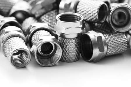 lots of sat plugs on white backgroundの写真素材