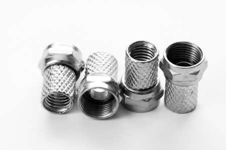 lots of sat plugs on white backgroundの写真素材