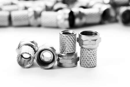 lots of sat plugs on white backgroundの写真素材