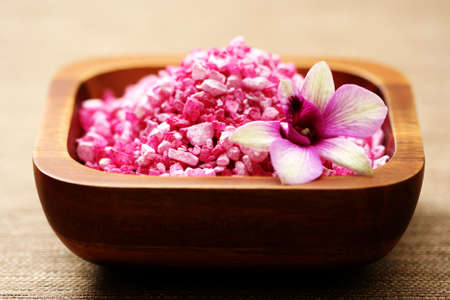 pink bath salt and beautiful orchid - body careの写真素材
