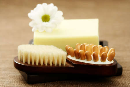soap and massager with white flower - beauty treatmentの写真素材