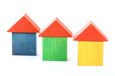 colorful wooden houses isolated on whiteの写真素材