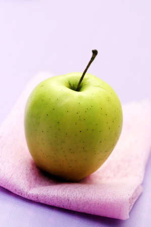 apple on pink - food and drinkの写真素材