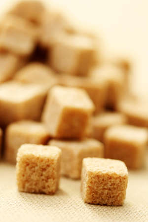 close-ups of brown sugar cubes - food and drink