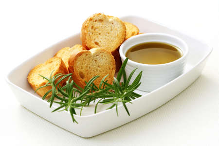 baguette and olive oil - delicious snack - food and drinkの写真素材