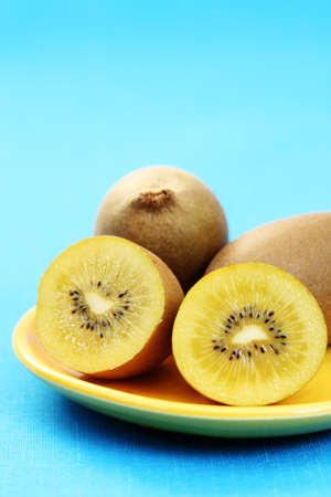 plate of golden kiwi - fruits and vegetablesの写真素材