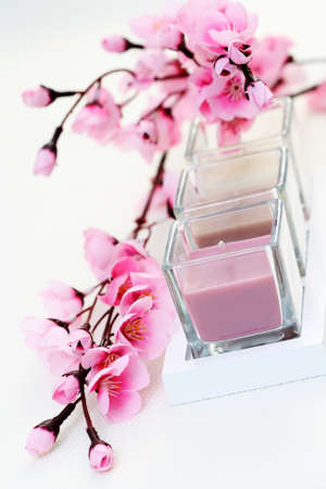 three candles and beautiful flowers - relaxing timeの写真素材