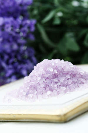 lavender bath salt and some flowers - beauty treatmentの写真素材