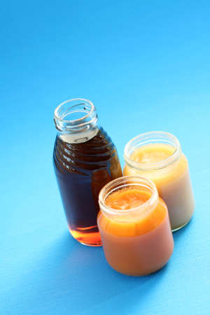 various jars of baby food - nutrition of babiesの写真素材