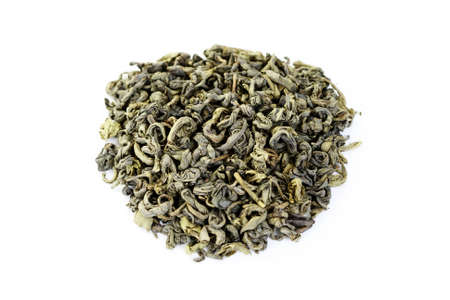 pile of green tea isolated on whiteの写真素材