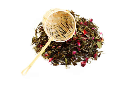 pile of white tea with rose petals on white - tea time