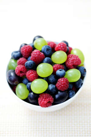 bowl full of delicious berry fruits - fruits and vegetables