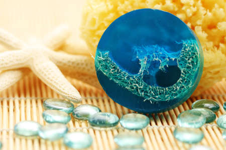 blue glycerin soap with shells and sponge - beauty treatmentの写真素材