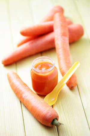 jar with carrot of baby food - food and drinkの写真素材