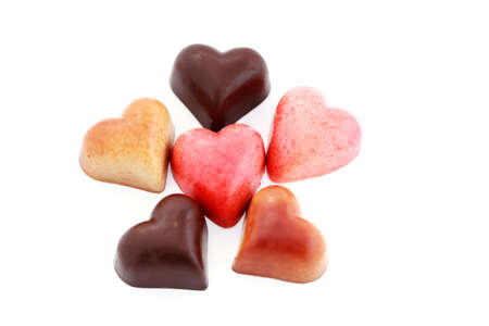 chocolate hearts pralines on white - sweet food