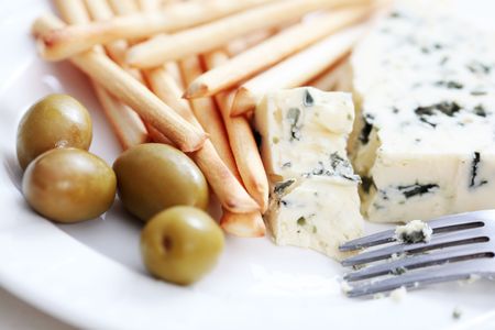 plate of grissini blue cheese and olives - food and drinkの写真素材