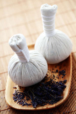 two massage stamps with lavender flowers - beauty treatmentの写真素材